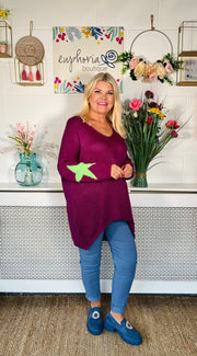 Plum Loose fitting free size jumper with star detail on both sleeves and back worn with denim magic trousers and Blue loafers