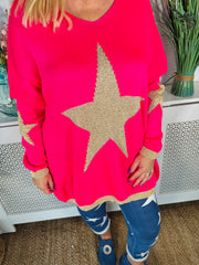 Ladies hot pink loose fitting free size jumper with sparkle star on front and sleeves with a sparkle trim cuff and hem