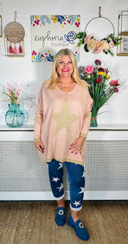 Ladies ballerina pink loose fitting free size jumper with sparkle star on front and sleeves with a sparkle trim cuff and hem