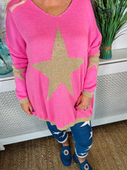 Ladies bubblegum pink loose fitting free size jumper with sparkle star on front and sleeves with a sparkle trim cuff and hem