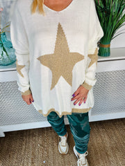 Ladies winter white loose fitting free size jumper with sparkle star on front and sleeves with a sparkle trim cuff and hem