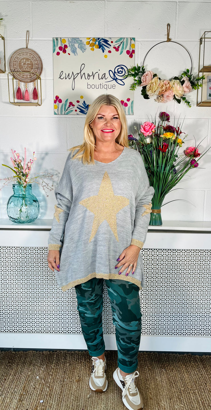 Ladies grey loose fitting free size jumper with sparkle star on front and sleeves with a sparkle trim cuff and hem