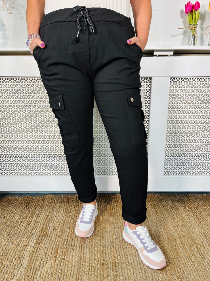 Black magic stretchy cargo pants with side pockets and elasticated waist