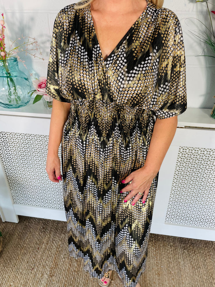 Close up of Metallic Gold patterned free size floaty midi dress with short sleeves